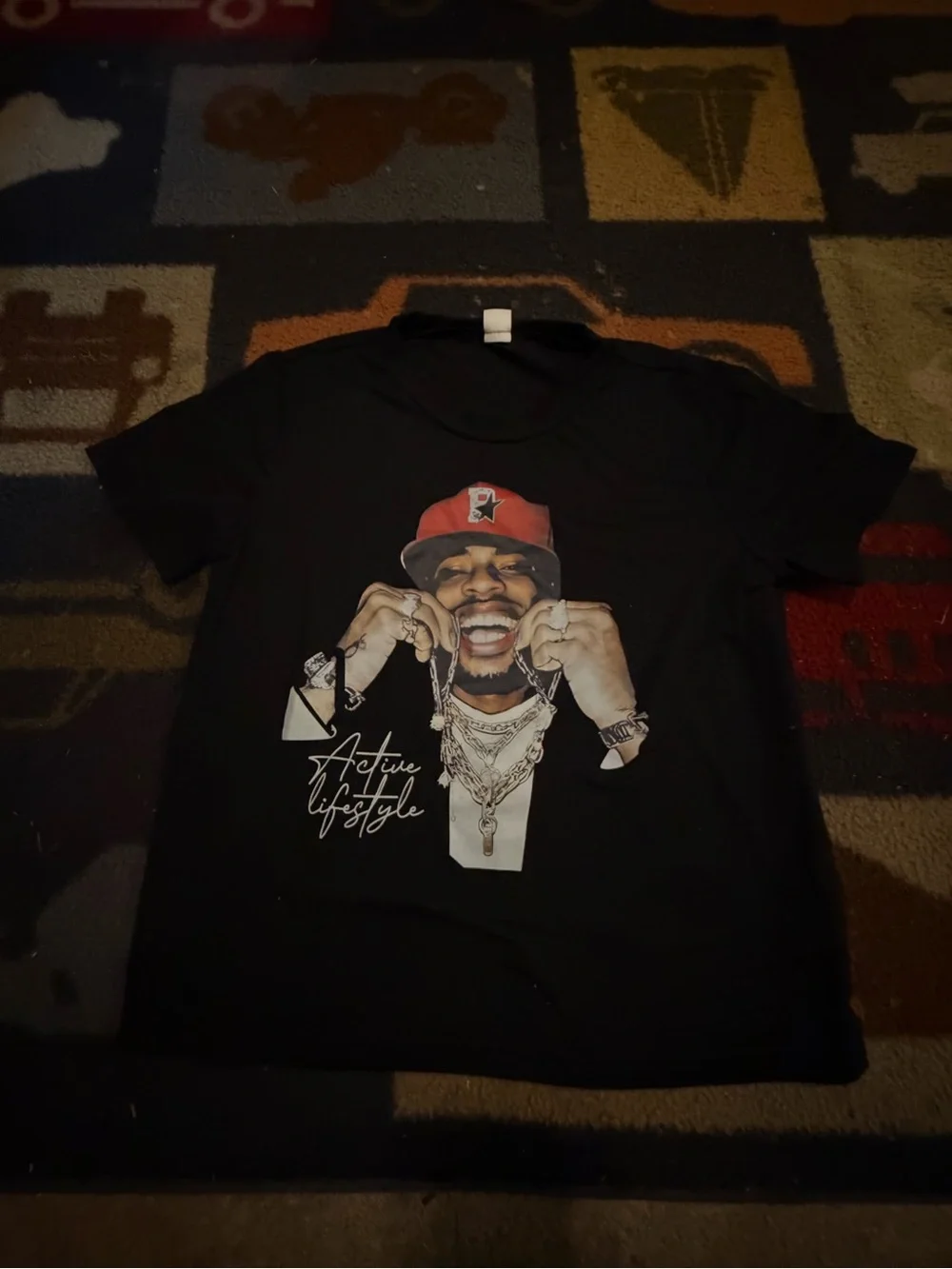 Black Graphic Men’s T-Shirt with Red Cap Illustration